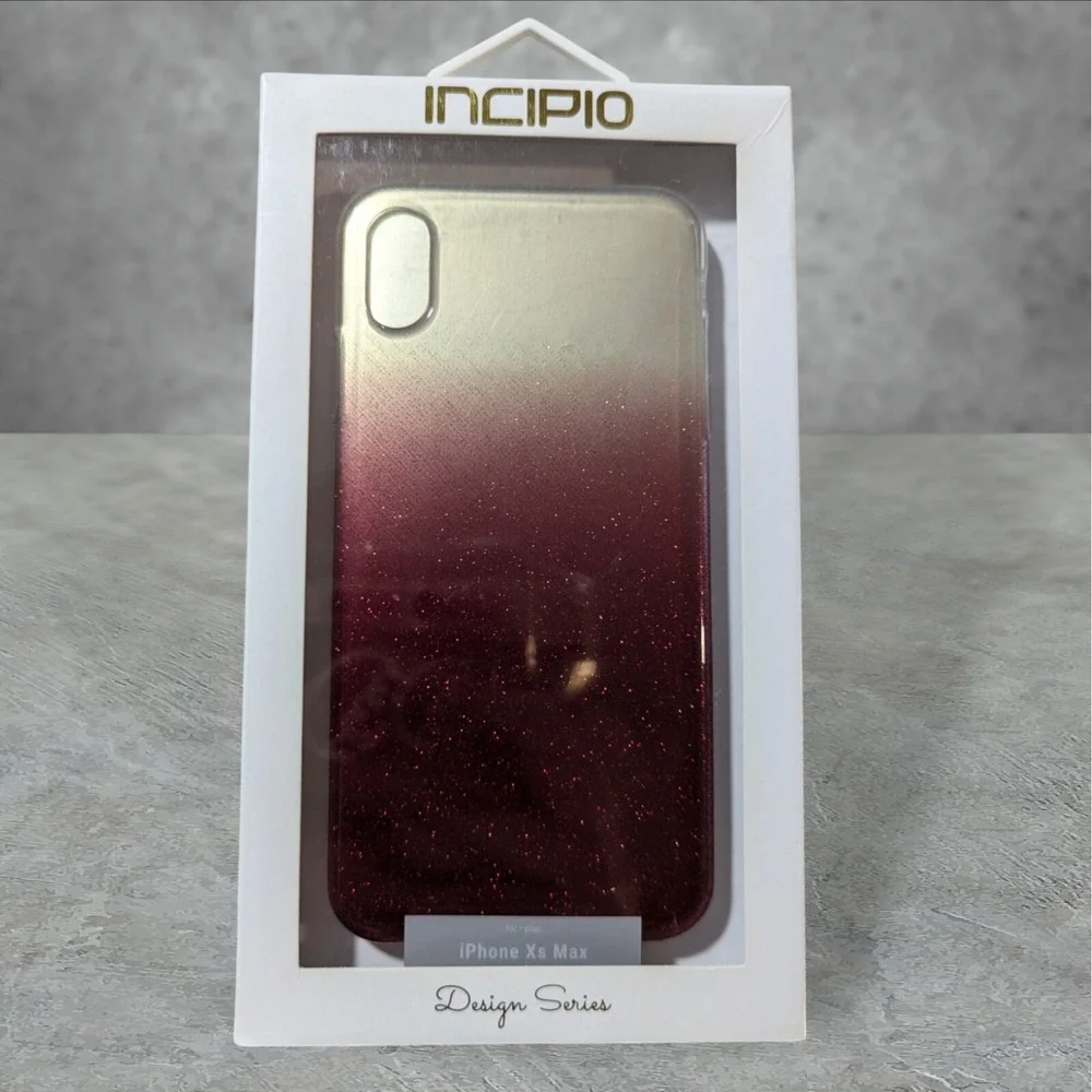 Q2. Incipio Design Series Case for Apple iPhone Xs Max -‎ Red/Gold Ombre Glitter